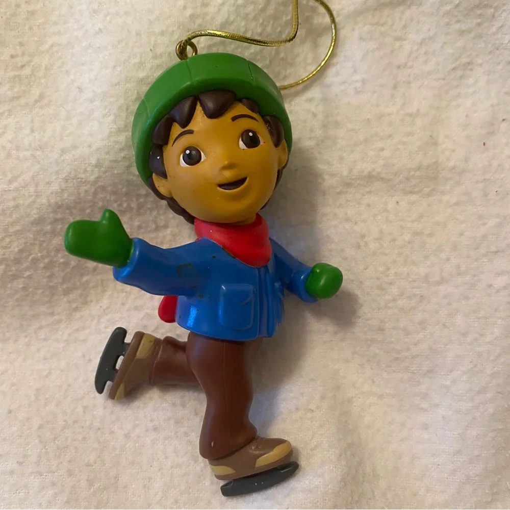 Go Diego and Dora holiday ornament characters with boots, swiped and Santa too!